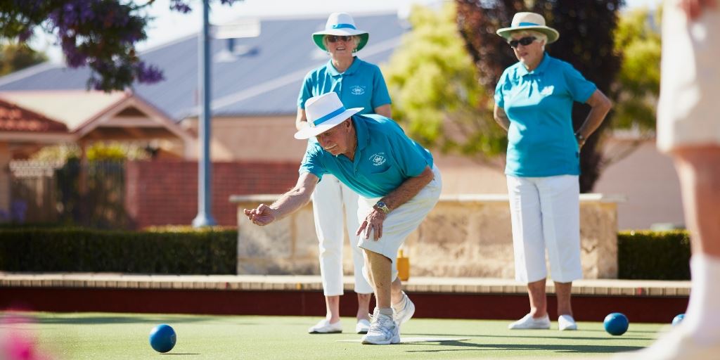 People playing bowls.