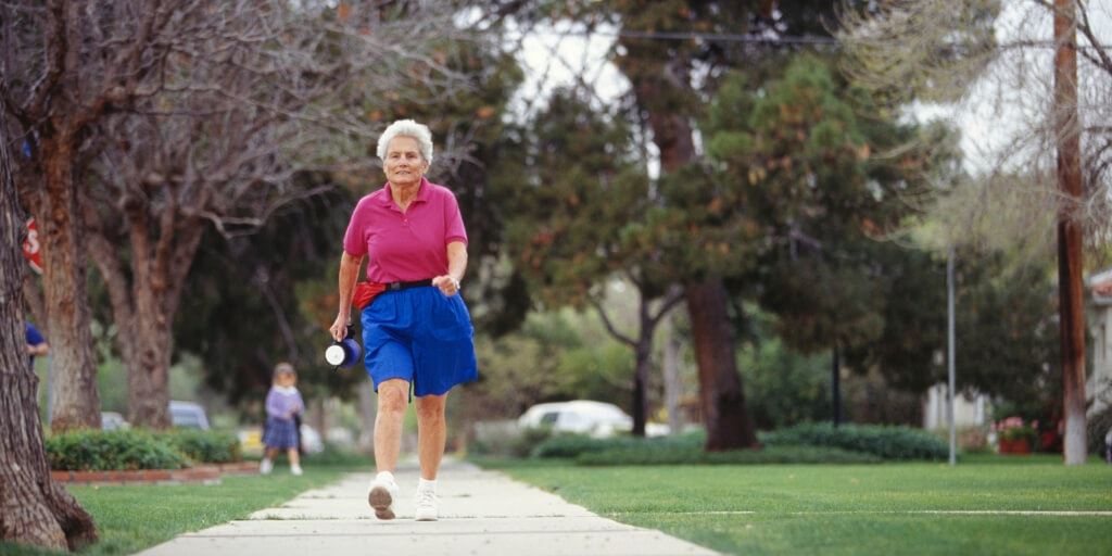 Person walking on footpath.