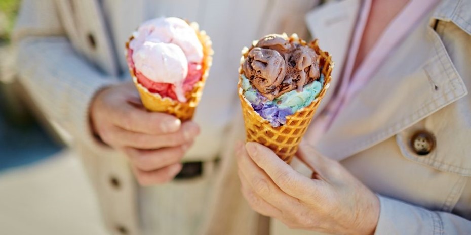 Clse up of a couple holding two ice cream cones