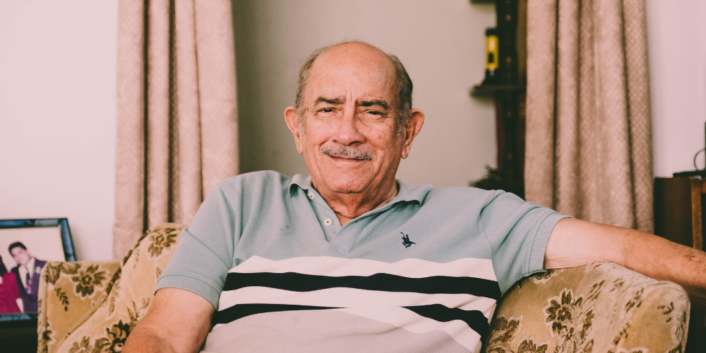 Man sitting on couch.