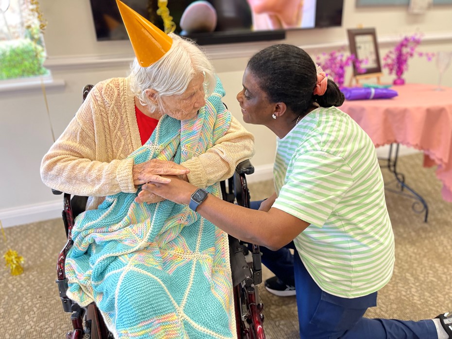 Brightwater The Village's Lorna sharing moment with care worker